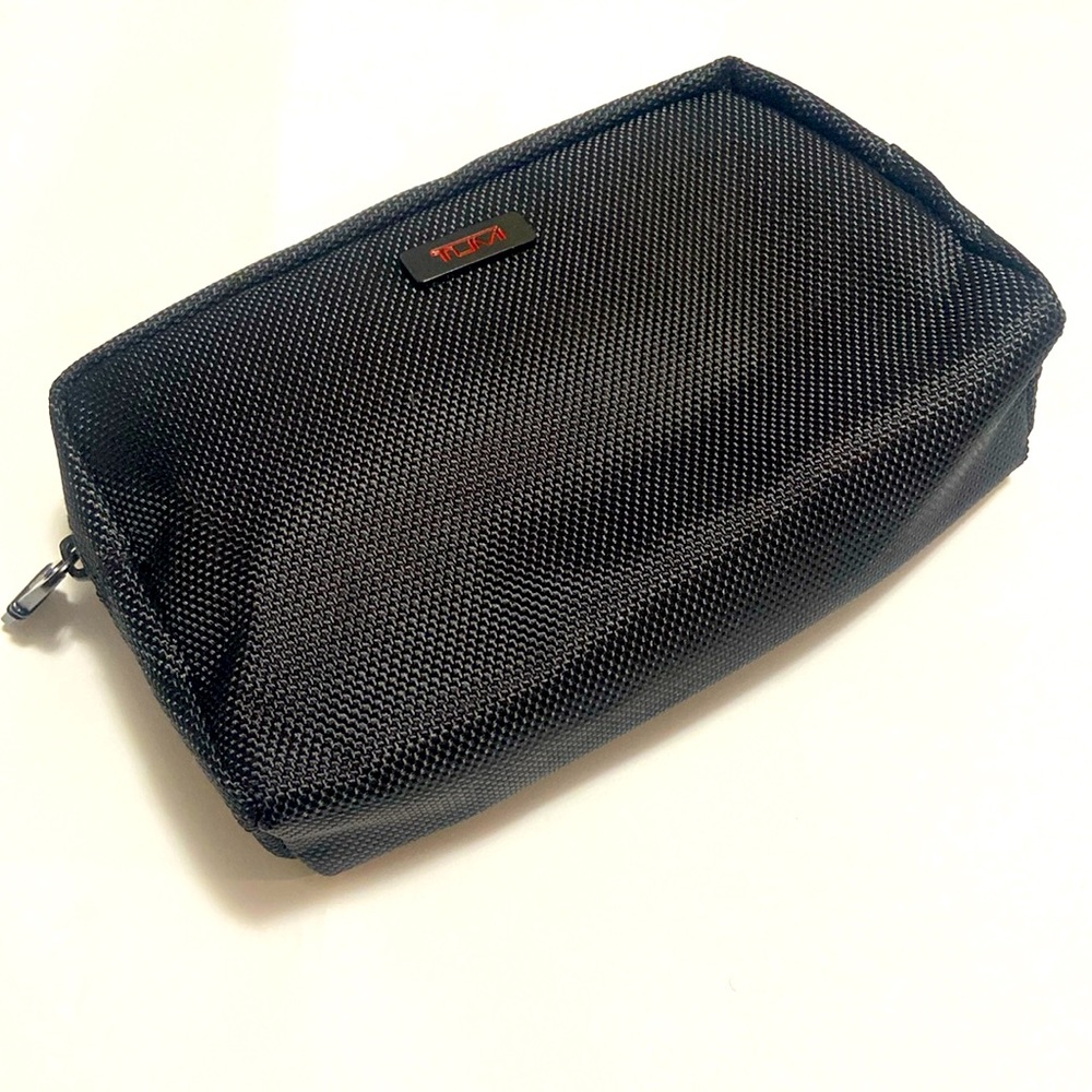 Tumi new black pouch with contents